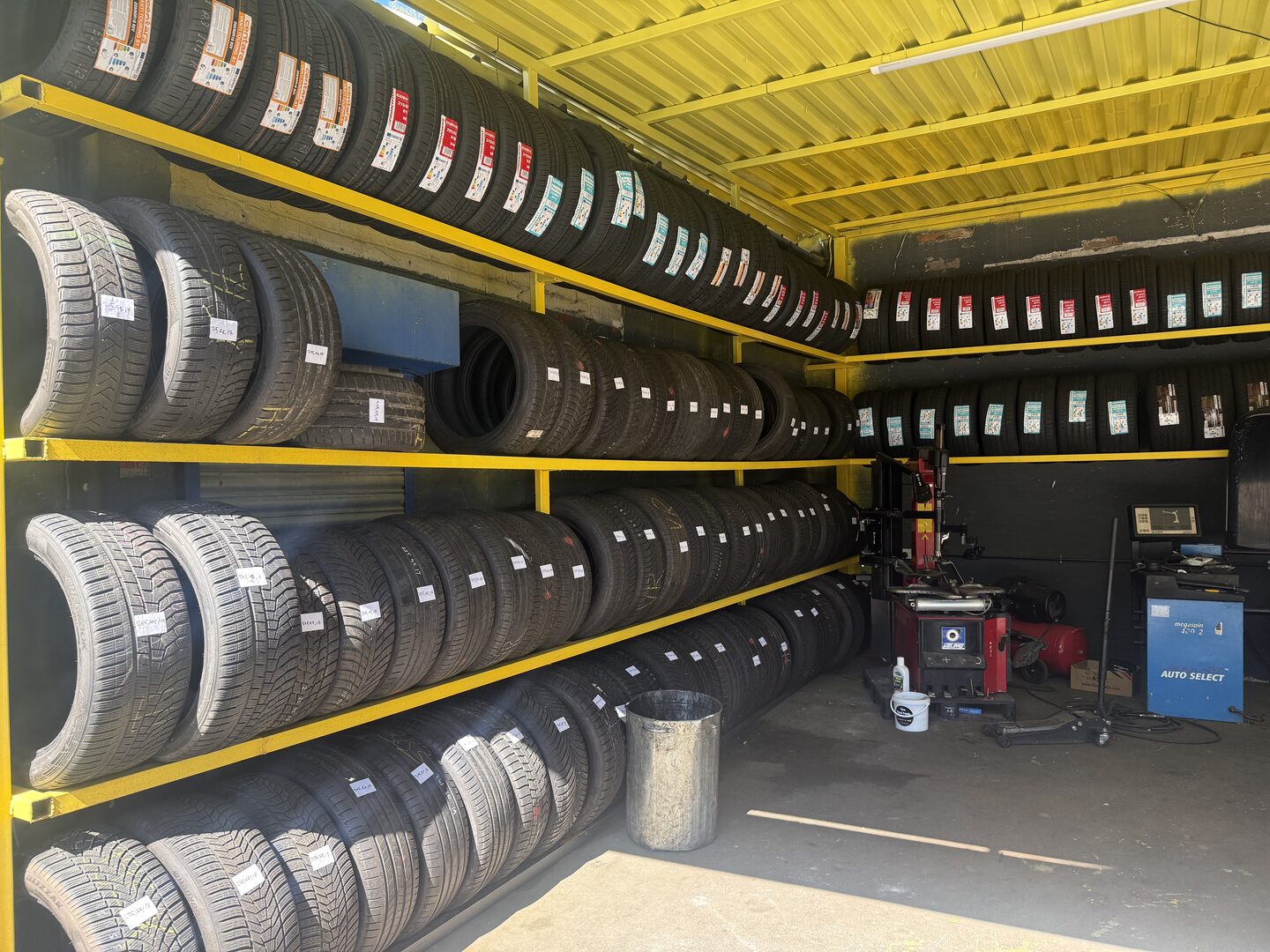 Tyre fitting work inside FS Brand Garage